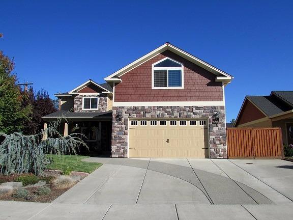 1945 Rabun Way Central Point, OR 97502 - Photo 2 of 30 a front view of a house with a yard and garage