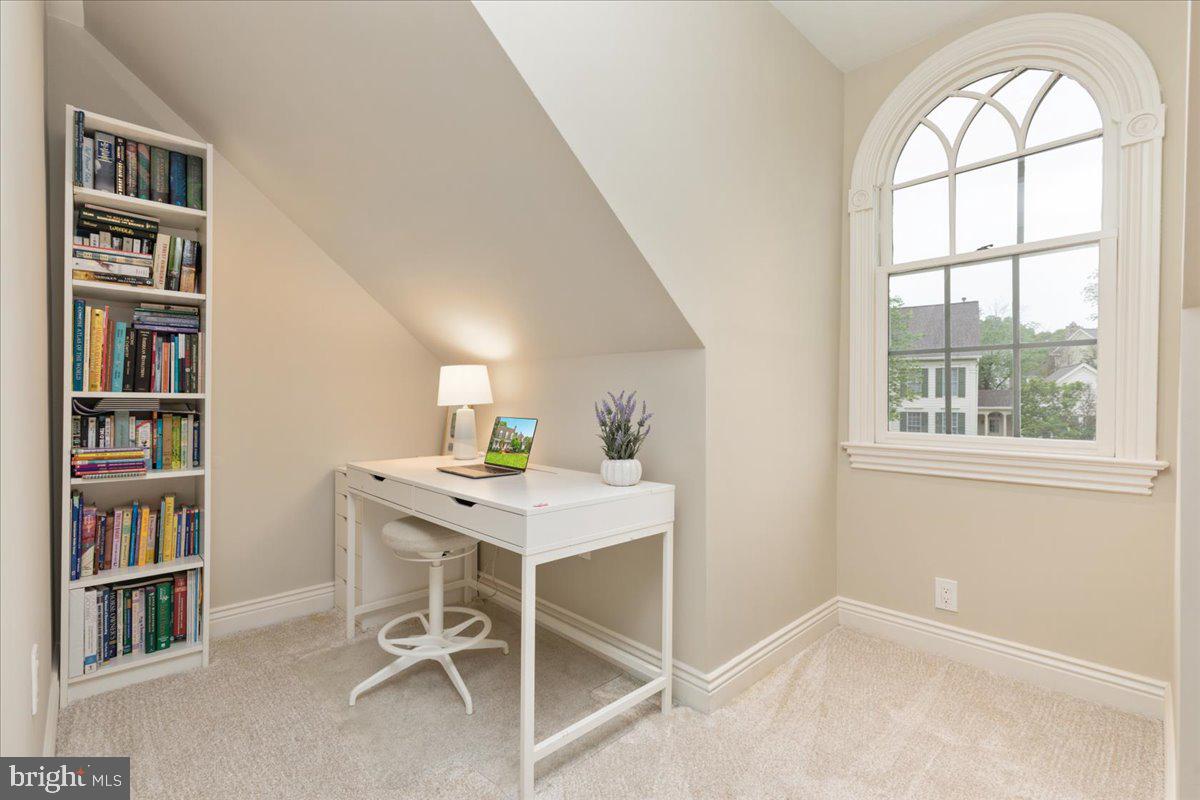 14915 Alpine Bay Loop Gainesville, VA 20155 - Photo 40 of 105 a view of a workspace with furniture and a window