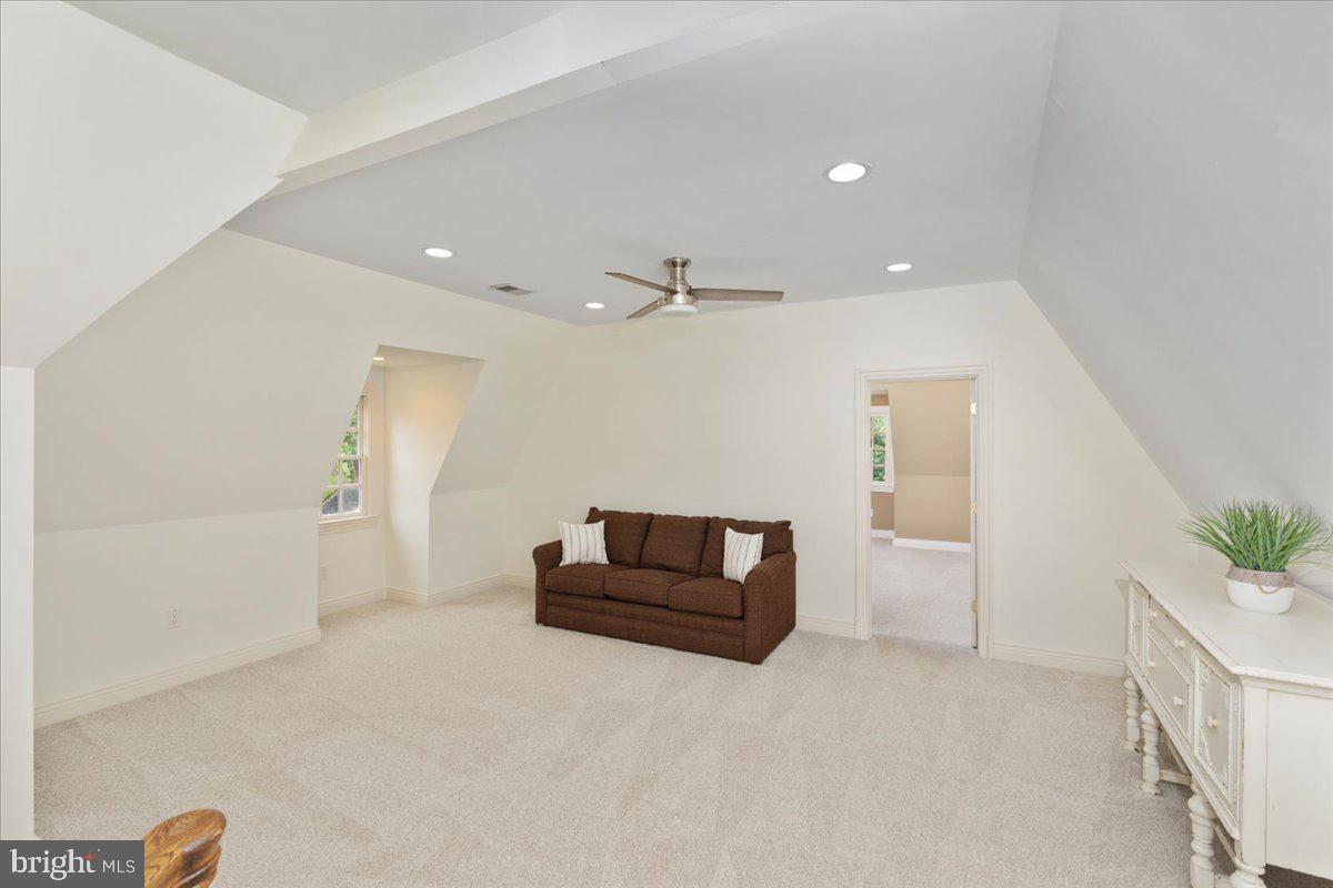 14915 Alpine Bay Loop Gainesville, VA 20155 - Photo 48 of 105 a living room with furniture and a rug