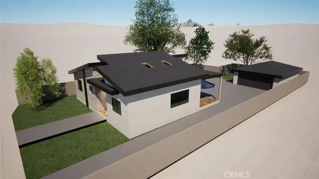 an aerial view of a house with a yard