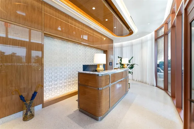 a kitchen with stainless steel appliances granite countertop a stove and a refrigerator