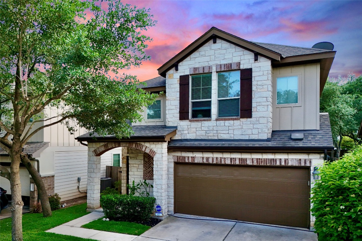7709 Menchaca Road, Unit 16 Austin, TX 78745 - Photo 1 of 1 a view of front of house with a yard