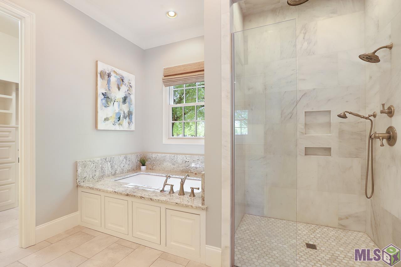 7706 Lane's End St. George, LA 70810 - Photo 18 of 37 Primary Bath Ensuite