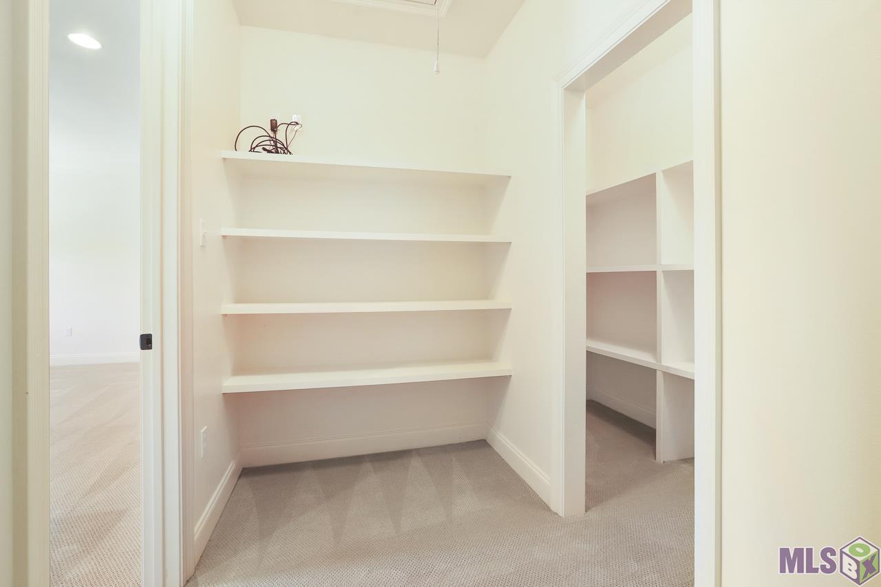 7706 Lane's End St. George, LA 70810 - Photo 30 of 37 Upstairs closet