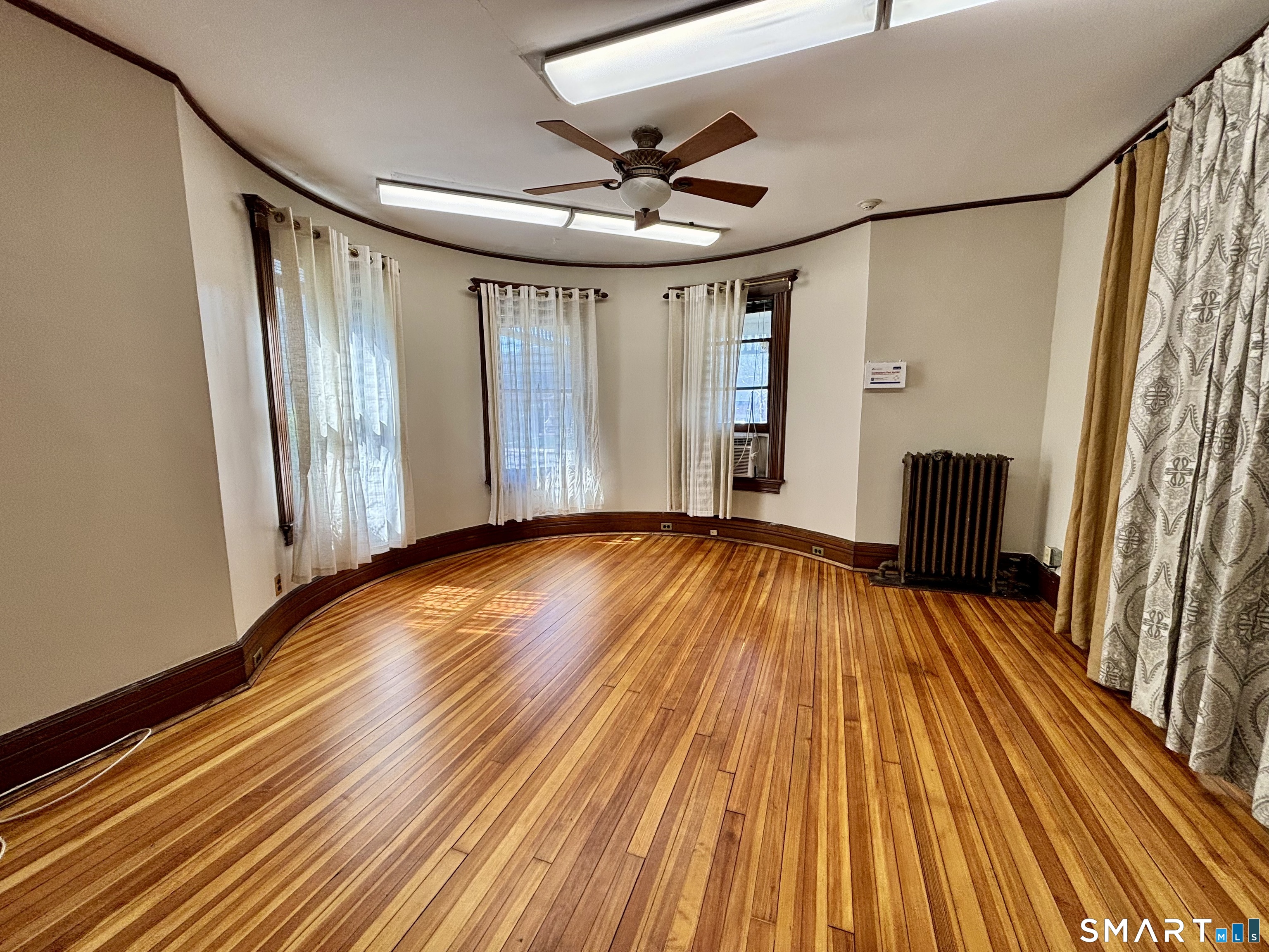 1887 Summer Street Stamford, CT 06905 - Photo 3 of 6 a view of entryway with wooden floor