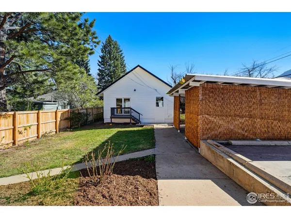 a front view of a house with a garage