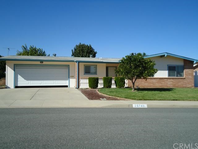 25740 Hartwick Road Menifee, CA 92586 - Photo 1 of 1 Fruit bearing orange tree, possible RV space on side.