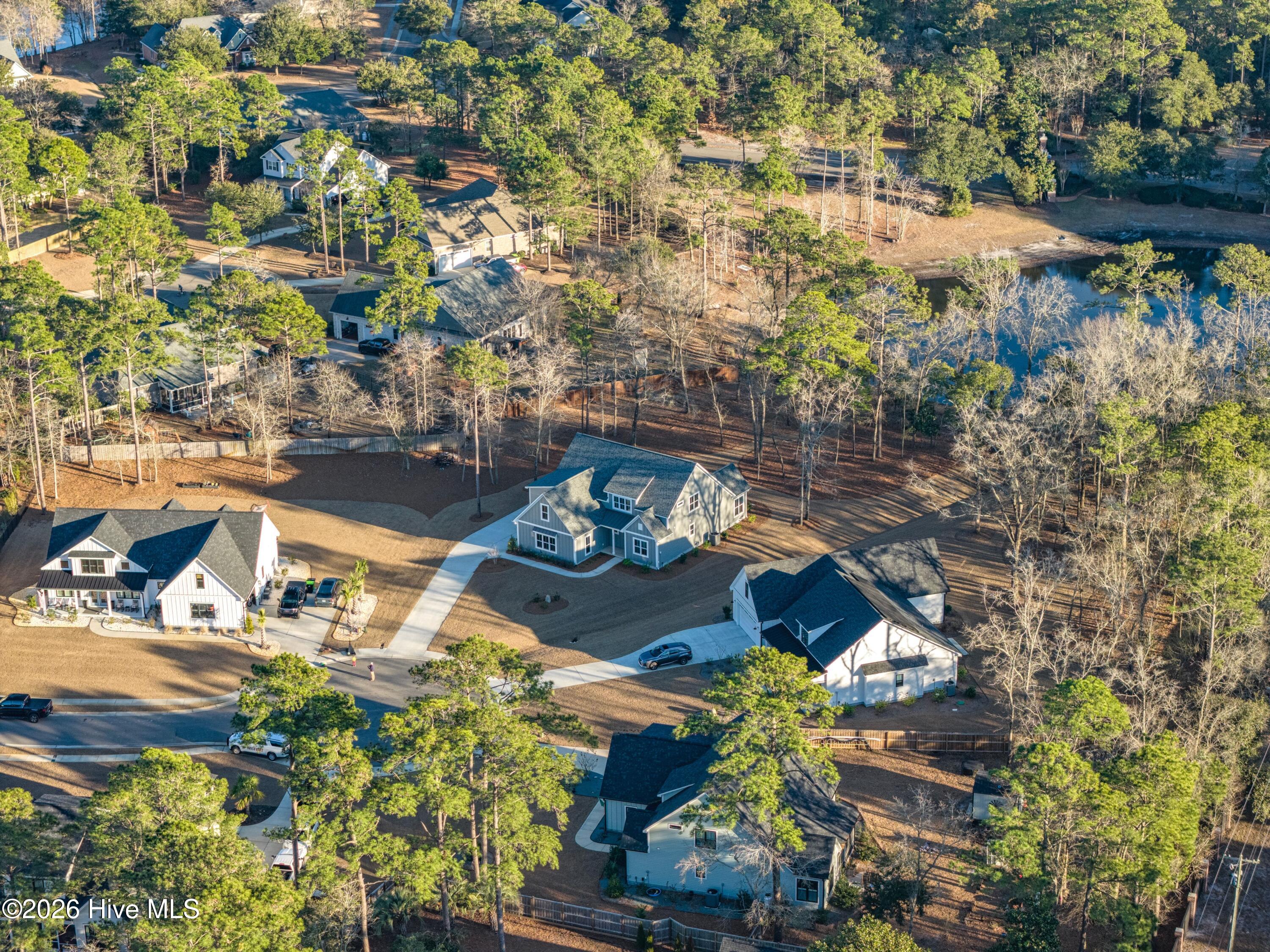 233 Hampton Court Hampstead, NC 28443 - Photo 3 of 77 003_dji_20260128092902_0622_d_copy_558