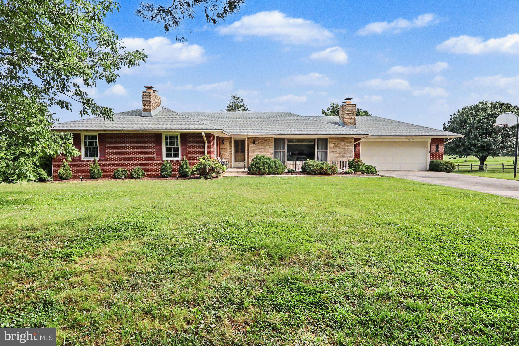 5 Eden Road Luray, VA 22835 - Photo 2 of 49 a view of a house with a yard and potted plants