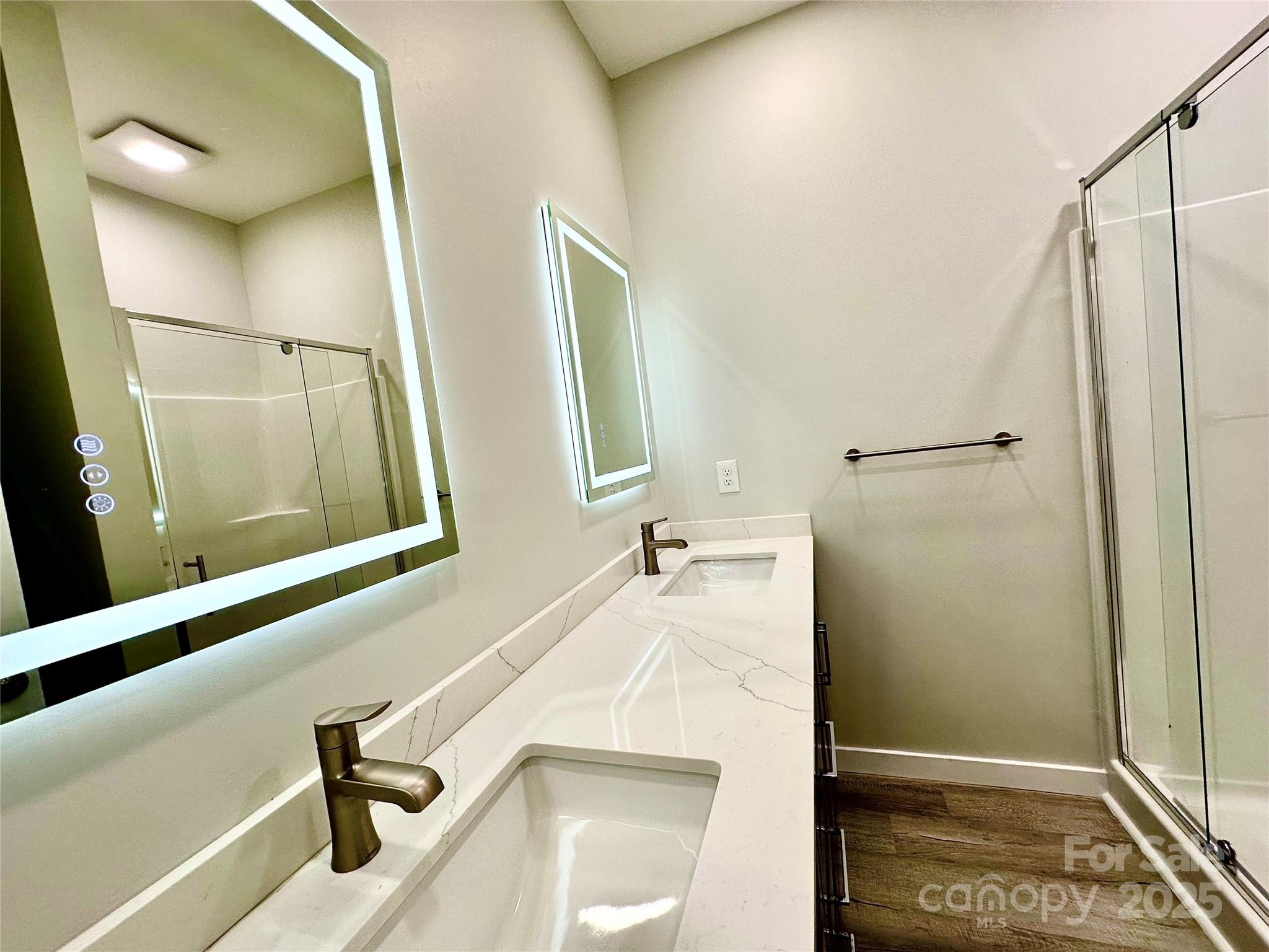 1171 Peach Orchard Road Jefferson, SC 29718 - Photo 18 of 30 a bathroom with a sink and a mirror