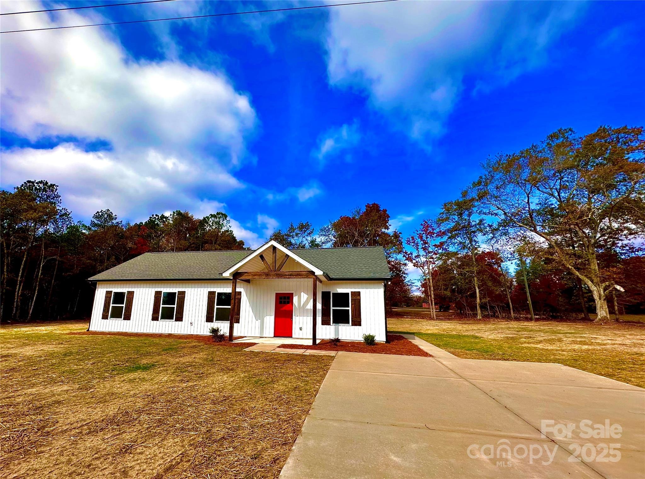 1171 Peach Orchard Road Jefferson, SC 29718 - Photo 2 of 30 a view of a house with a yard