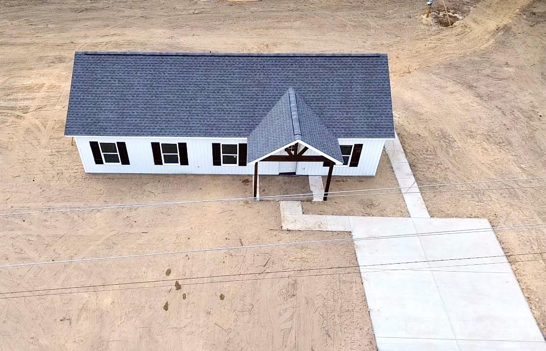 1171 Peach Orchard Road Jefferson, SC 29718 - Photo 21 of 30 a view of a house with pool and sitting area
