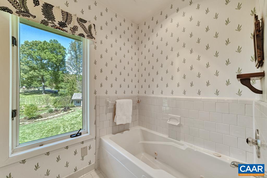 304 Club Road Louisa, VA 23093 - Photo 31 of 55 Jetted Tub and Shower. Tile floors.