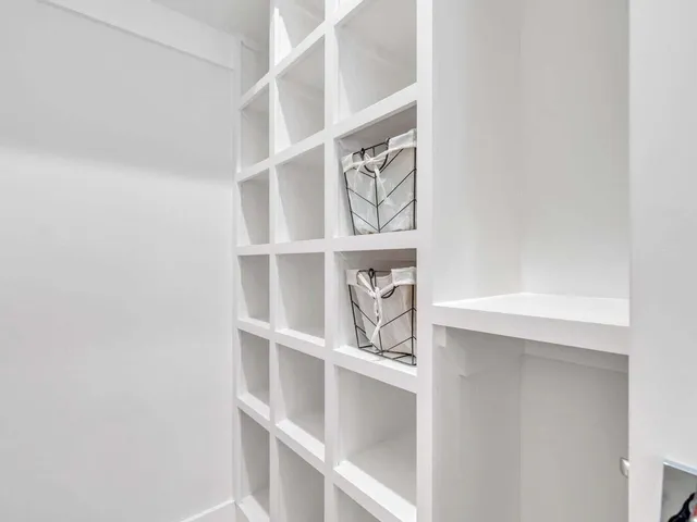 a view of a balcony with wooden floor