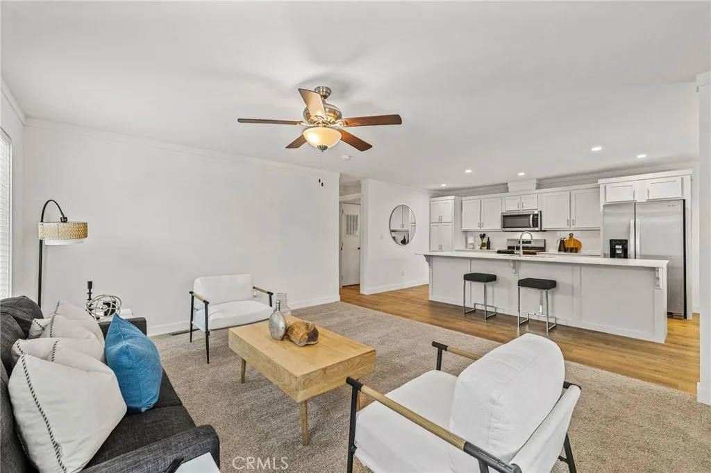 1901 Dayton, Unit 2 Chico, CA 95928 - Photo 12 of 48 a living room with furniture kitchen view and a chandelier