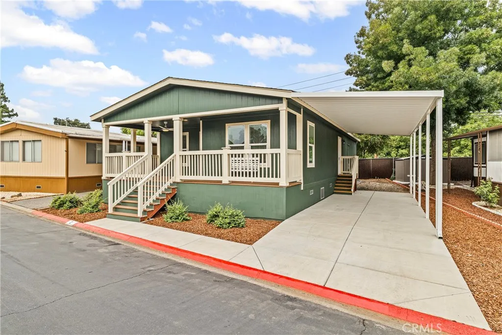 1901 Dayton, Unit 2 Chico, CA 95928 - Photo 2 of 48 a front view of a house with a garden and plants