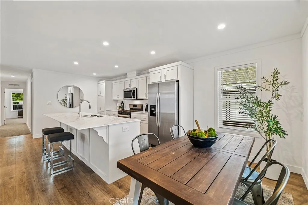 1901 Dayton, Unit 2 Chico, CA 95928 - Photo 22 of 48 a view of a dining room with furniture window and wooden floor