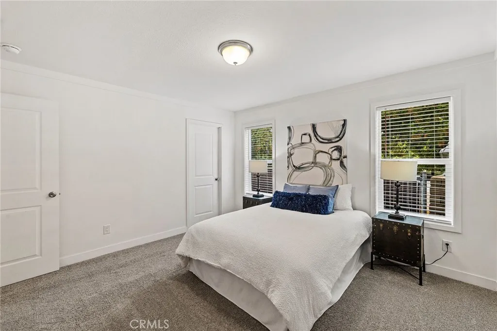 1901 Dayton, Unit 2 Chico, CA 95928 - Photo 25 of 48 a bedroom with a bed and a window