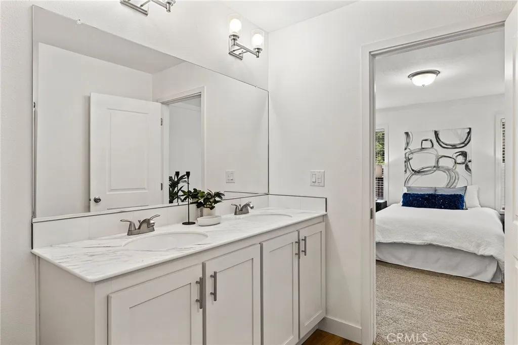 1901 Dayton, Unit 2 Chico, CA 95928 - Photo 29 of 48 a bathroom with a sink and a mirror