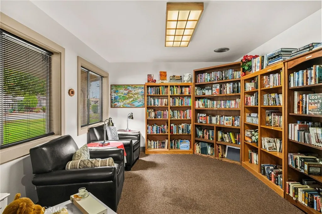 1901 Dayton, Unit 2 Chico, CA 95928 - Photo 41 of 48 a living room with furniture and a book shelf
