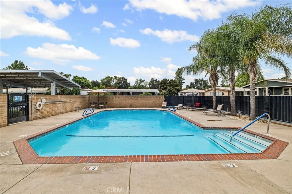 1901 Dayton, Unit 2 Chico, CA 95928 - Photo 43 of 48 a view of a swimming pool with lounge chairs