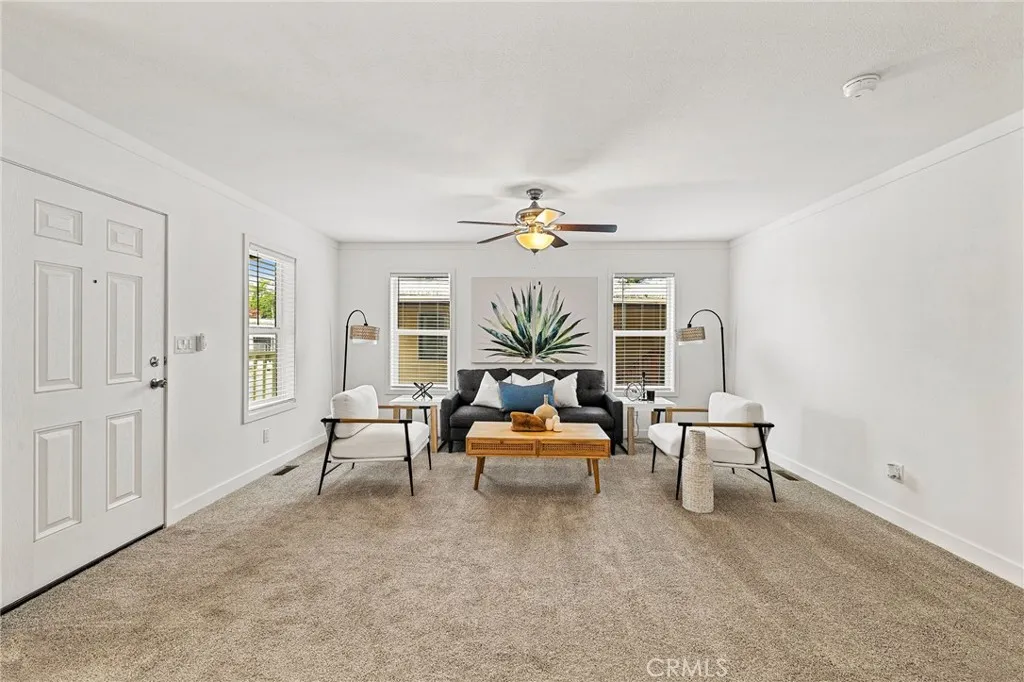 1901 Dayton, Unit 2 Chico, CA 95928 - Photo 9 of 48 a living room with furniture and chandelier