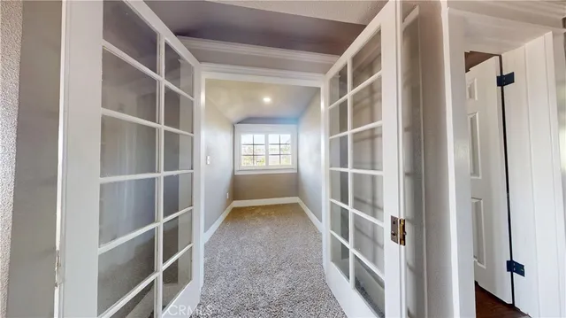 a view of closet with empty racks