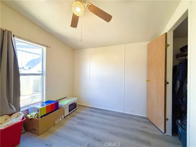 a room with furniture and a window