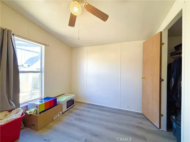 a room with furniture and a window