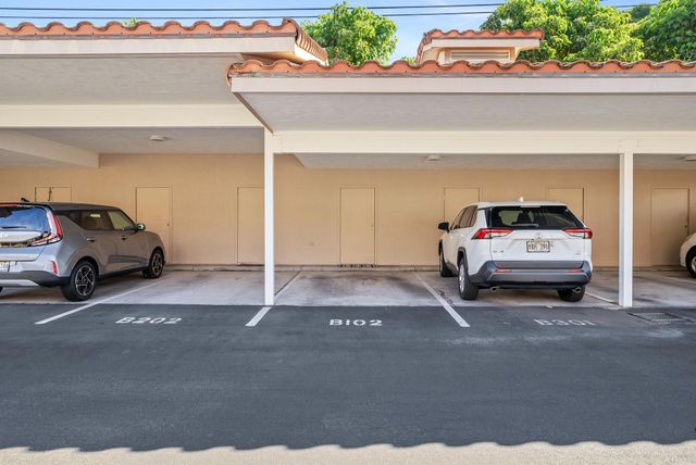 a view of a car parked in front of a house
