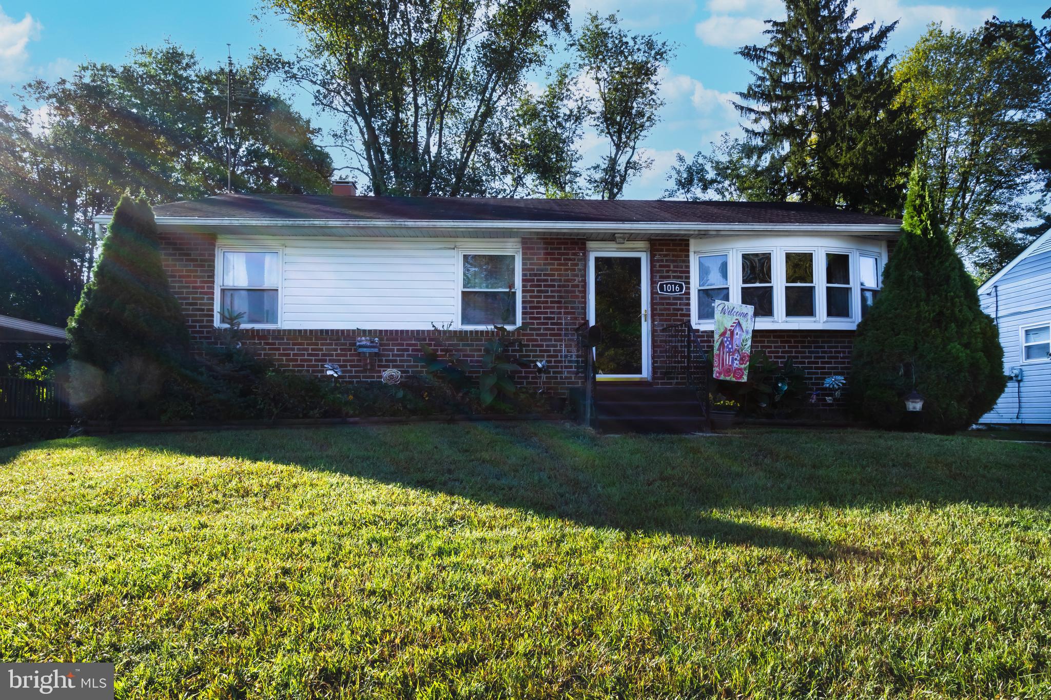 1016 Kingsbury Road Reisterstown, MD 21136 - Photo 1 of 28 a front view of a house with a yard