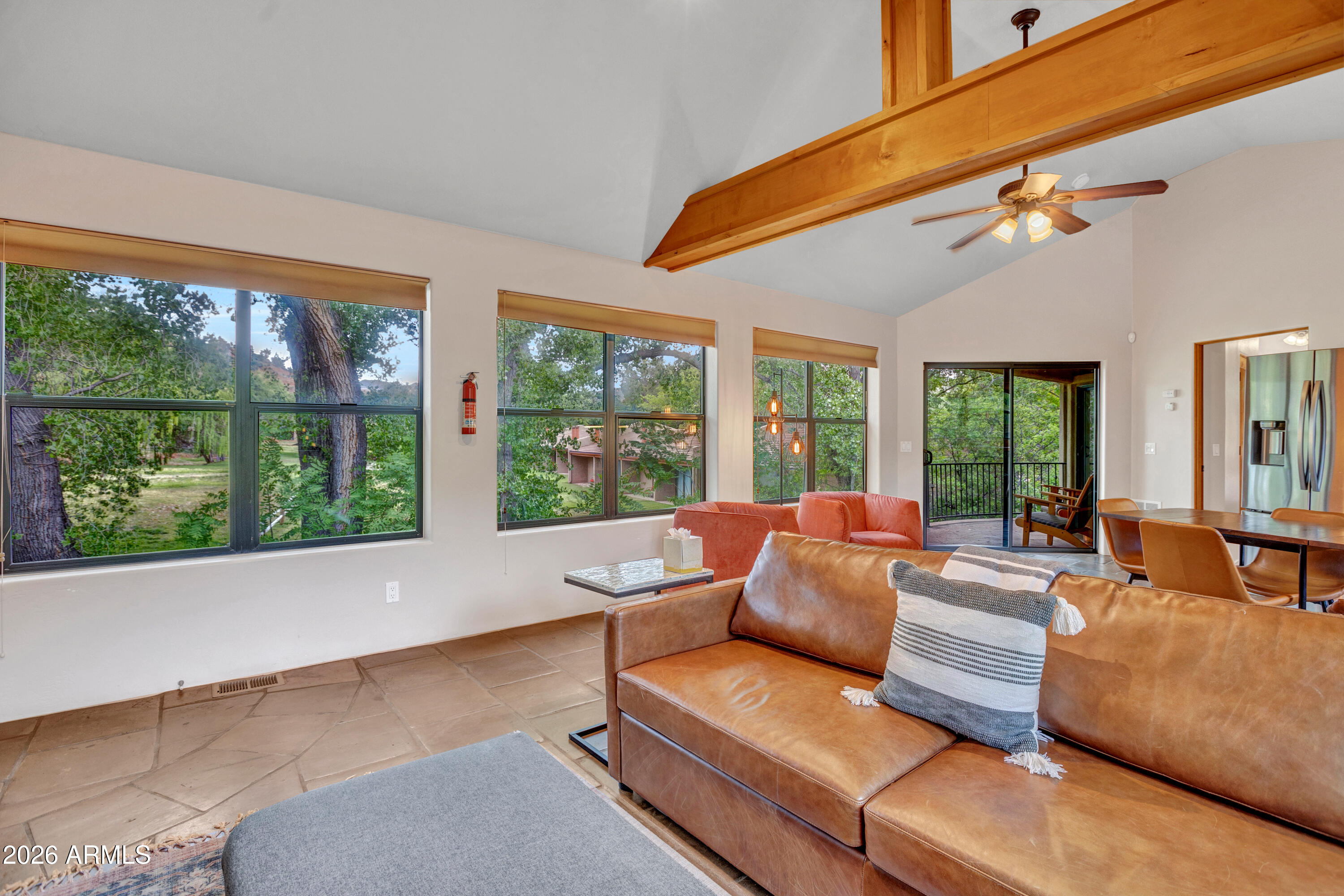 55 Ranch House Circle Sedona, AZ 86336 - Photo 45 of 61 a living room with furniture and large windows
