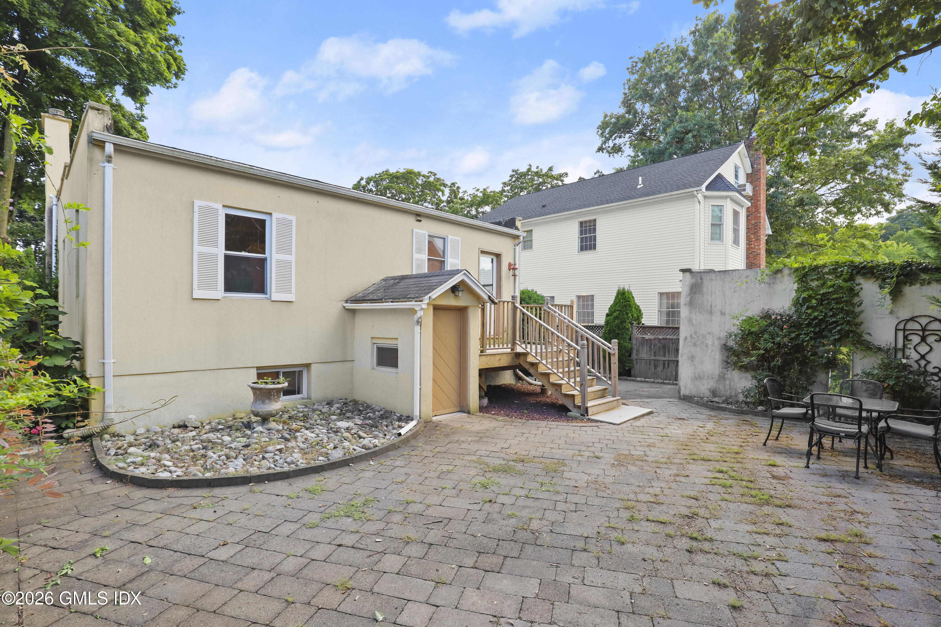 11 Rex Street Greenwich, CT 06831 - Photo 17 of 22 a view of a house with backyard