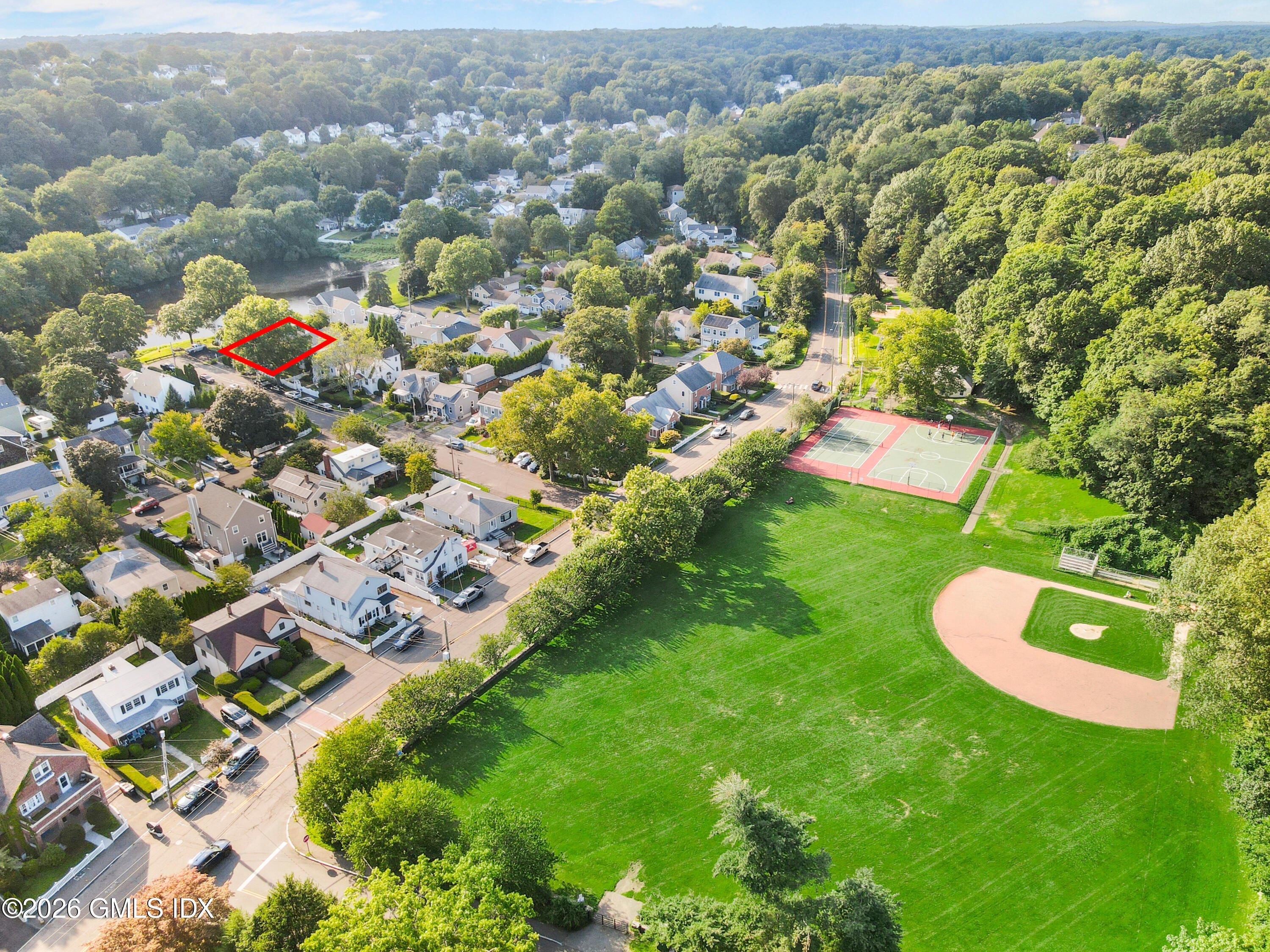 11 Rex Street Greenwich, CT 06831 - Photo 20 of 22 an aerial view of residential houses with outdoor space and trees
