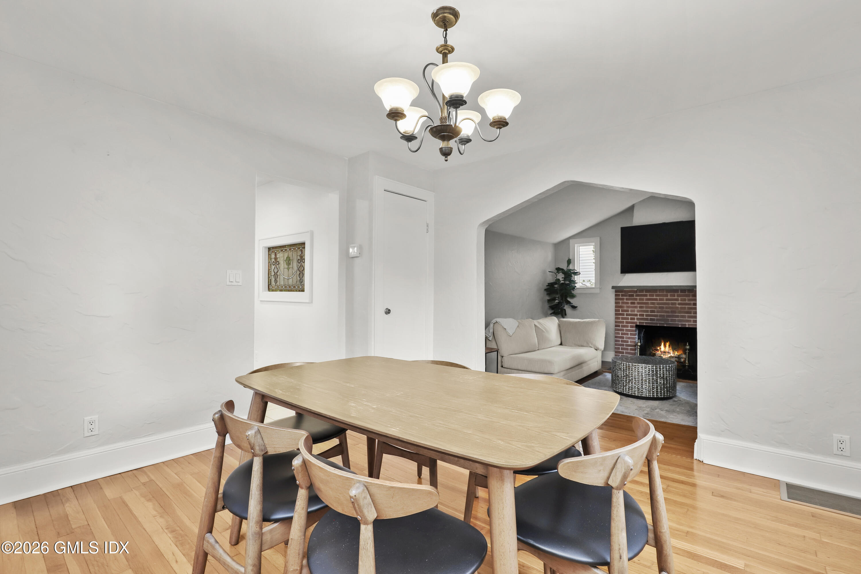 11 Rex Street Greenwich, CT 06831 - Photo 7 of 22 a view of a dining room with furniture and wooden floor