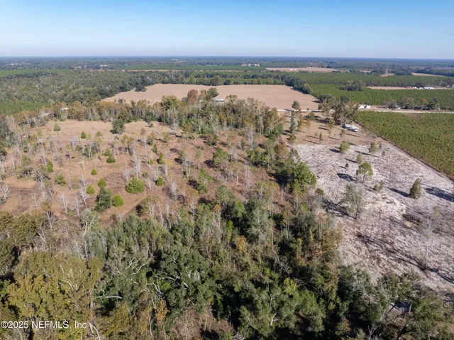 a view of an ocean beach and city