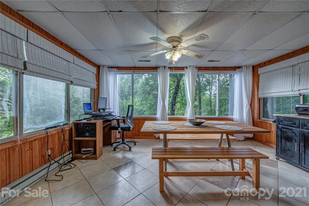 647 Blacksnake Road Stanley, NC 28164 - Photo 14 of 35 a living room with furniture and a large window