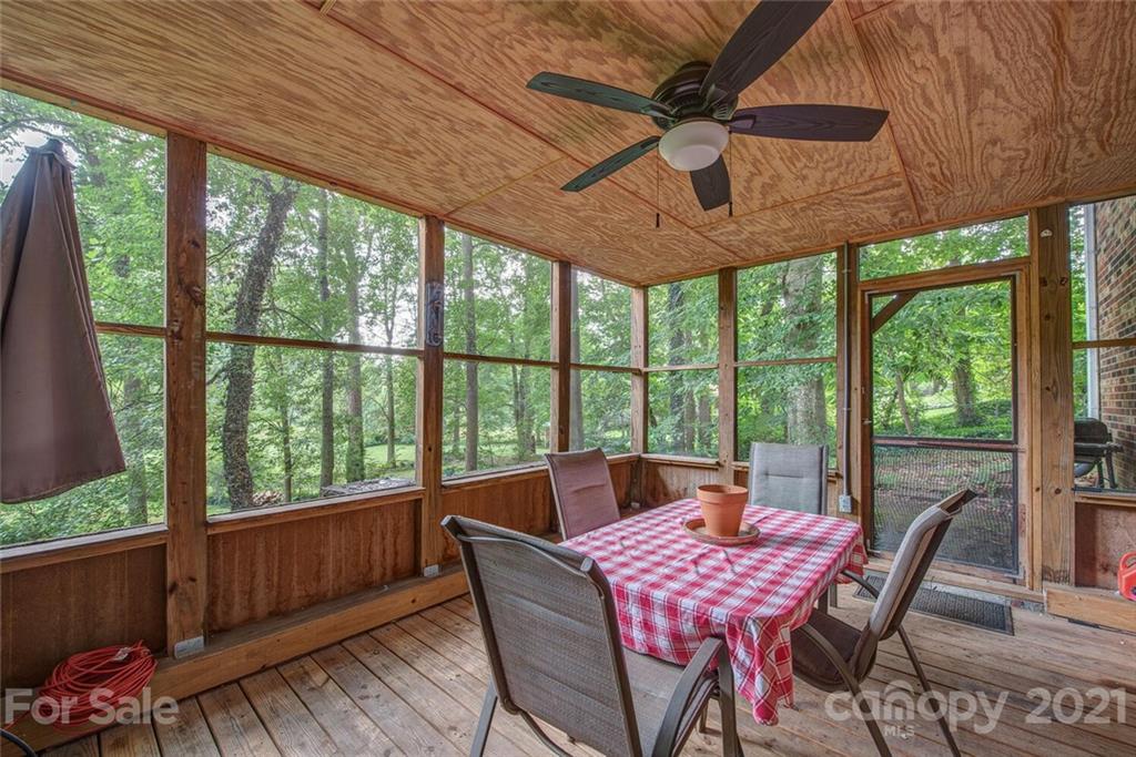 647 Blacksnake Road Stanley, NC 28164 - Photo 28 of 35 a dining room with furniture window and outside view