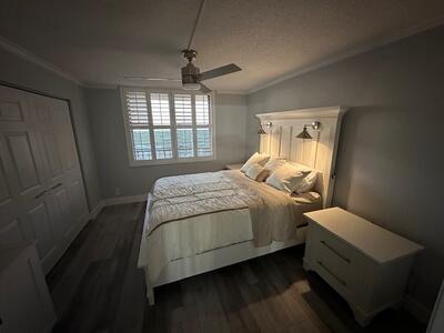 9500 South Ocean Drive, Unit 1909 Jensen Beach, FL 34957 - Photo 17 of 40 a bedroom with a bed and window