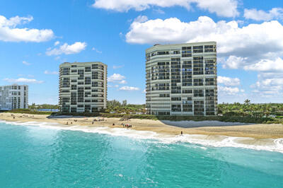 9500 South Ocean Drive, Unit 1909 Jensen Beach, FL 34957 - Photo 27 of 40 a view of a large building with a yard