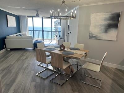 9500 South Ocean Drive, Unit 1909 Jensen Beach, FL 34957 - Photo 7 of 40 a workspace with wooden floor and windows