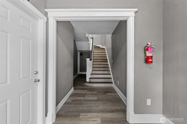 a view of entryway with wooden floor
