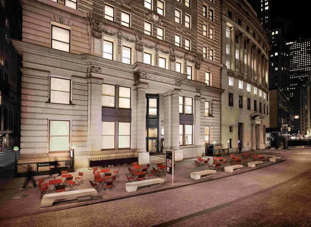 a group of cars parked in front of a building