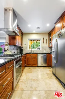 a living room with furniture plant and a potted plant