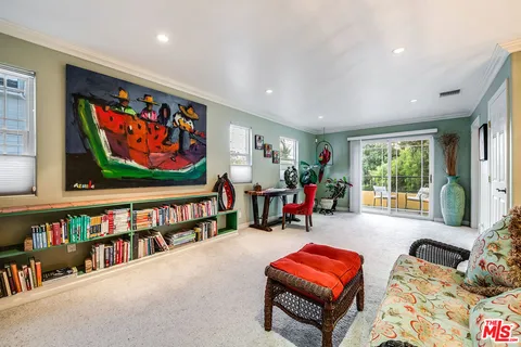 a room with furniture and a flat screen tv