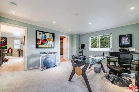 an aerial view of a pool yard patio and outdoor seating