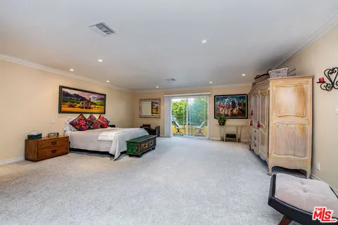 a bathroom with a sink vanity and a mirror