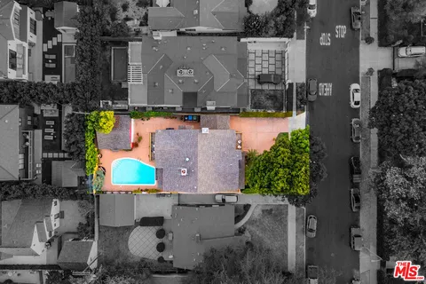 a view of an swimming pool with an outdoor seating