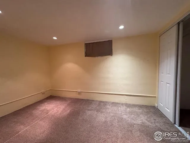 a view of a chair and table in the patio