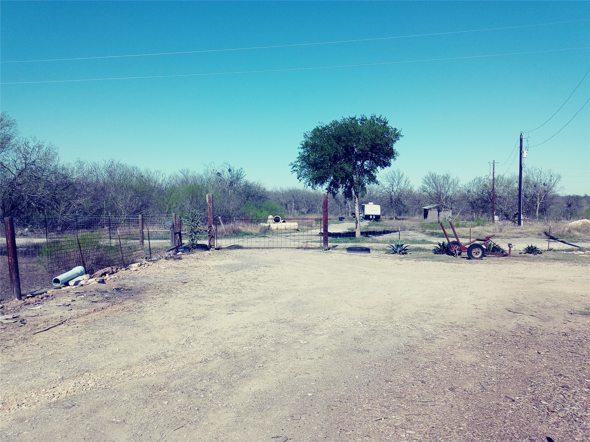 11717 Schriber Road, Unit B Buda, TX 78610 - Photo 3 of 7 a view of a swimming pool with outdoor seating